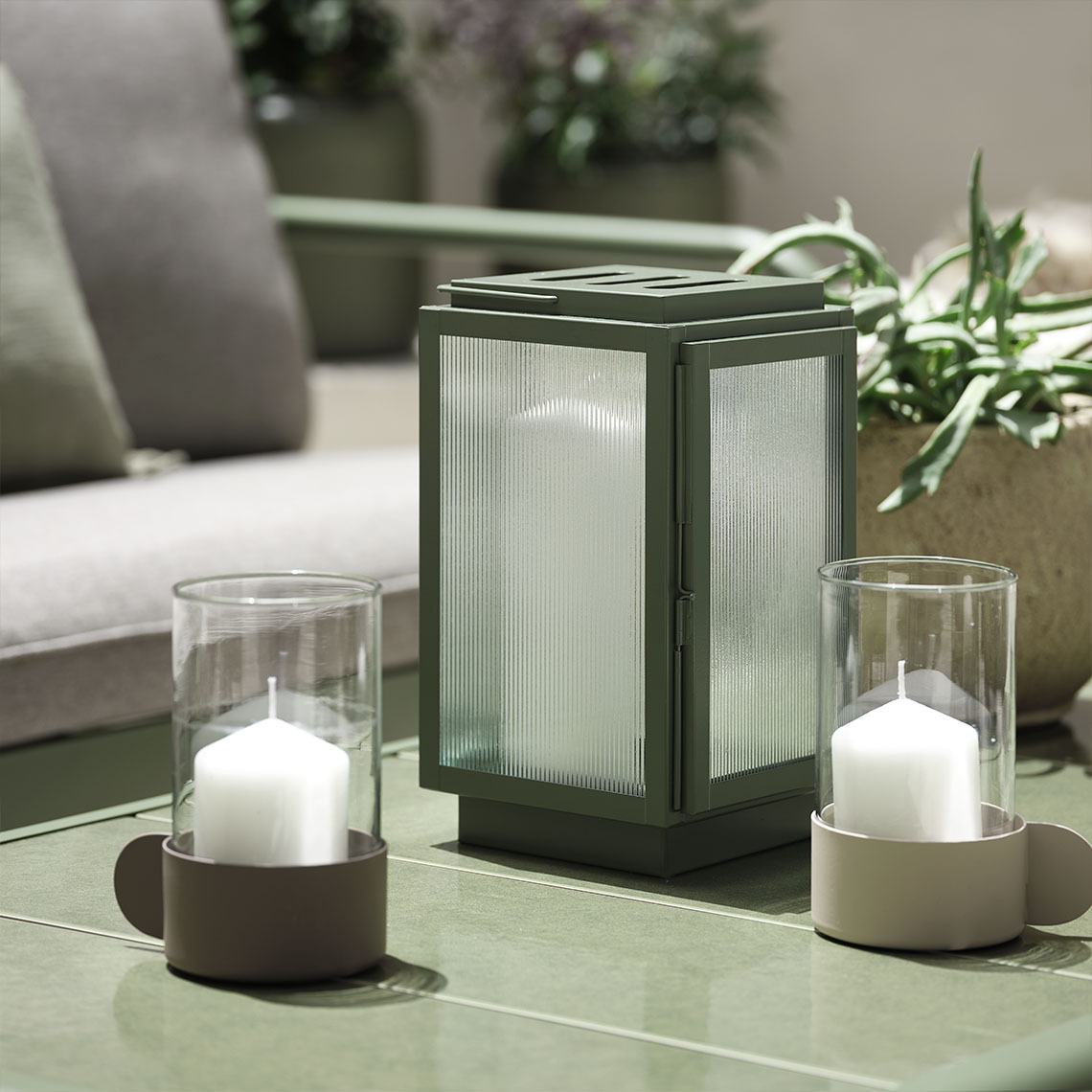 BRUMBASSE and GULBUG lanterns Outdoor lanterns on lounge table
