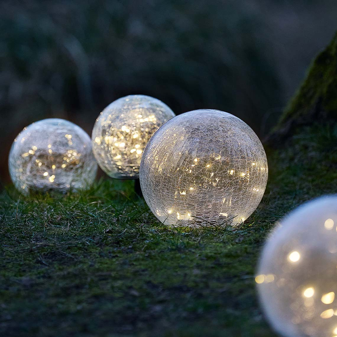The HAVSVALE solar lamp is available in two sizes Round globe solar lamps made from glass