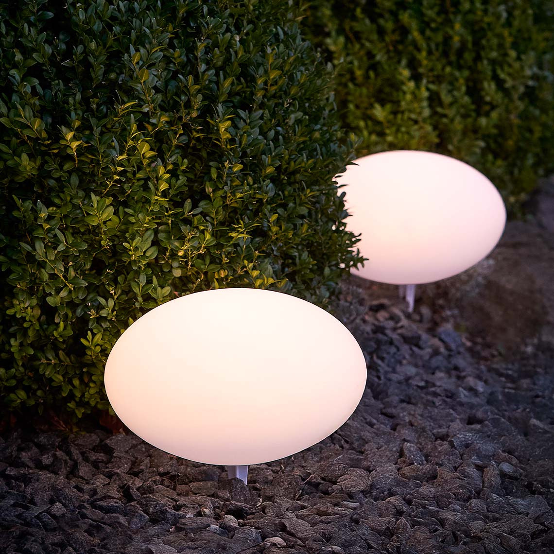 The HAVESANGER solar lamp is available in two sizes White, round solar lamps with soft, warm light