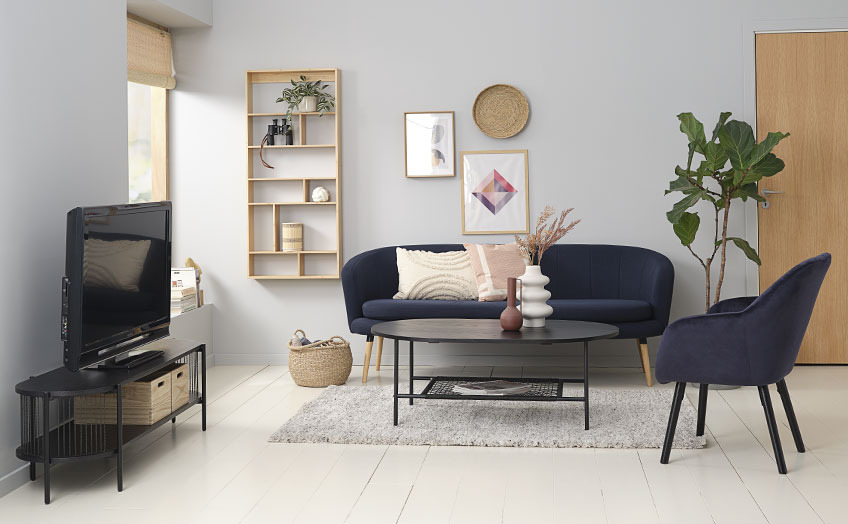 EGELEV TV bench is available in black and light oak Living room with black TV bench, sofa, coffee table and armchair